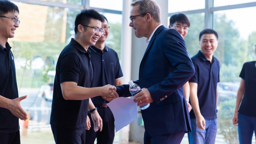 CEO greeting employees at new Changshu Plant grand opening